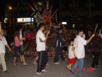 Photo of the people praying and walking round Tai Soo Ia before burning