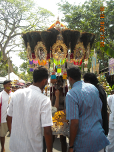 Devotees carrying heavy kavadi