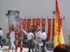 Photo of Walk round front of temple for chneah hoay ceremony preparation