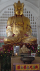 Photo of Buddha's Statue at Entrance into Pagoda
