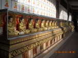 A section of 108 sitting buddha statue in Wat Machimmaran